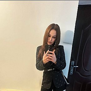 Olesia Super Busty
 escort in Brussels offers Cumshot on body (COB) services
