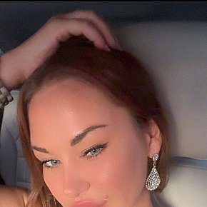 Olesia Super Busty
 escort in Brussels offers Cumshot on body (COB) services