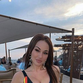 Olesia Super Busty
 escort in Brussels offers Cumshot on body (COB) services