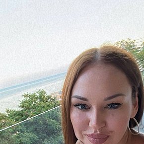 Olesia Super Busty
 escort in Brussels offers Cumshot on body (COB) services