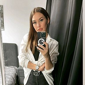 Olesia Super Busty
 escort in Brussels offers Cumshot on body (COB) services