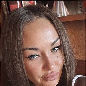 Olesia Super Busty
 escort in Brussels offers Cumshot on body (COB) services
