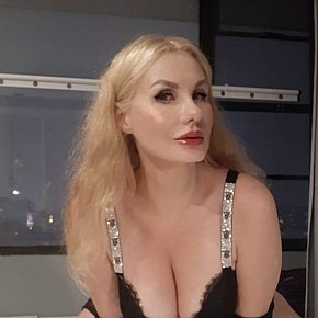 Julia Super Busty
 escort in Guangzhou offers French Kissing services