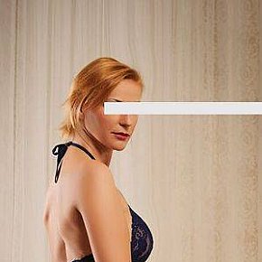 Simone Mature escort in Munich offers Erotic massage services