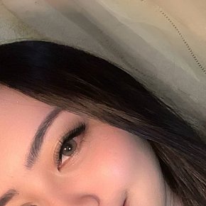 Aura-Bella escort in Kuta Bali offers Ball Licking and Sucking services