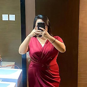 Aura-Bella escort in Kuta Bali offers Ball Licking and Sucking services