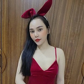 Trang escort in Singapore City offers Erotic massage services