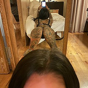Tattooed-Angel escort in Kuala Lumpur offers Fingering services