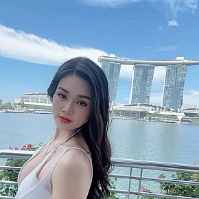 Tina escort in Singapore City offers Girlfriend Experience (GFE) services