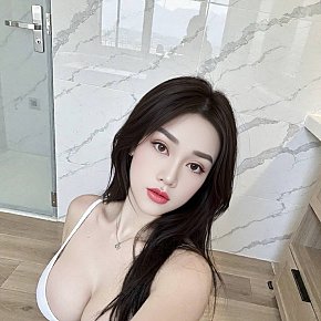 Tina escort in Singapore City offers Girlfriend Experience (GFE) services