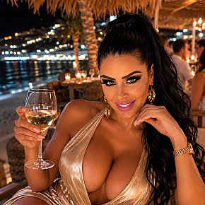 Claudia-Ferrari escort in London offers Dildo/sex toys services