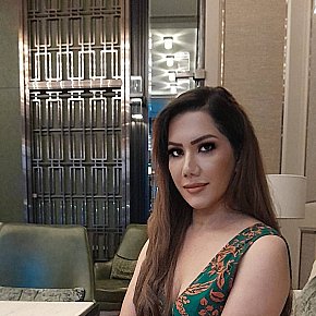Aziza super busty escort in Kuala Lumpur offers cumshot on body (COB) services
