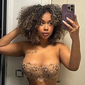 Cacao Occasional
 escort in London offers Intimate massage services