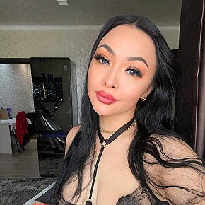 Ferrari escort in Dubai offers Strap on services