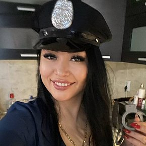 Ferrari escort in Dubai offers Strap on services