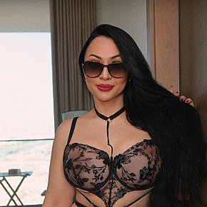 Ferrari escort in Dubai offers Strap on services