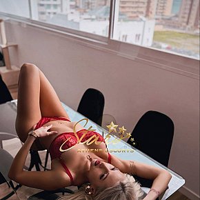 ELINA-STARS All Natural
 escort in Athens offers Erotic massage services