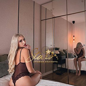 ELINA-STARS All Natural
 escort in Athens offers Erotic massage services