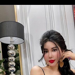 Linh-EvA escort in Abu Dhabi offers French Kissing services