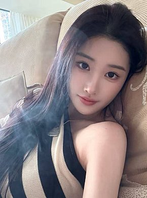 Tracy escort in Guangzhou offers Blowjob without Condom services