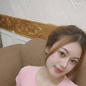 khaeera Petite
 escort in Jakarta offers French Kissing services